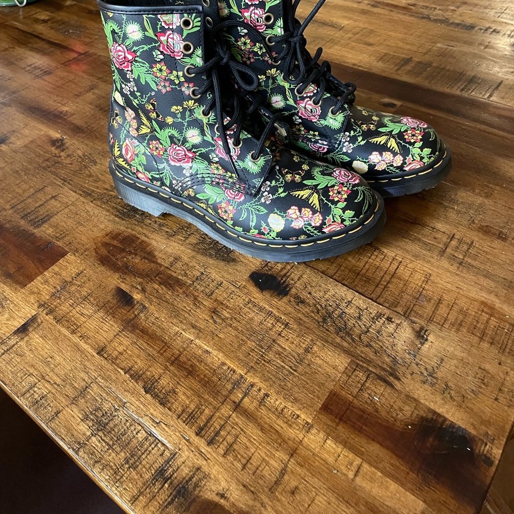 Black with multiple colored flowers Doc Marten boots. Brand new! Never worn!
